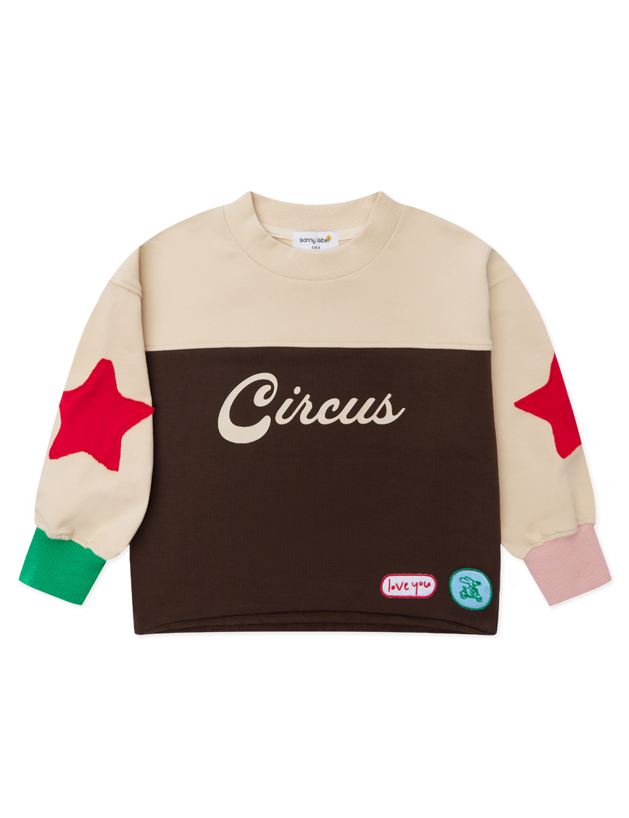 Sonny Label Circus26 retro sweatshirt flat lay on a grey background — cosy cotton for cool days.