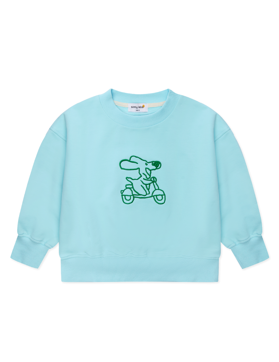 Sonny Label Circus26 sky blue sloppy joe sweatshirt flat lay on a grey background.