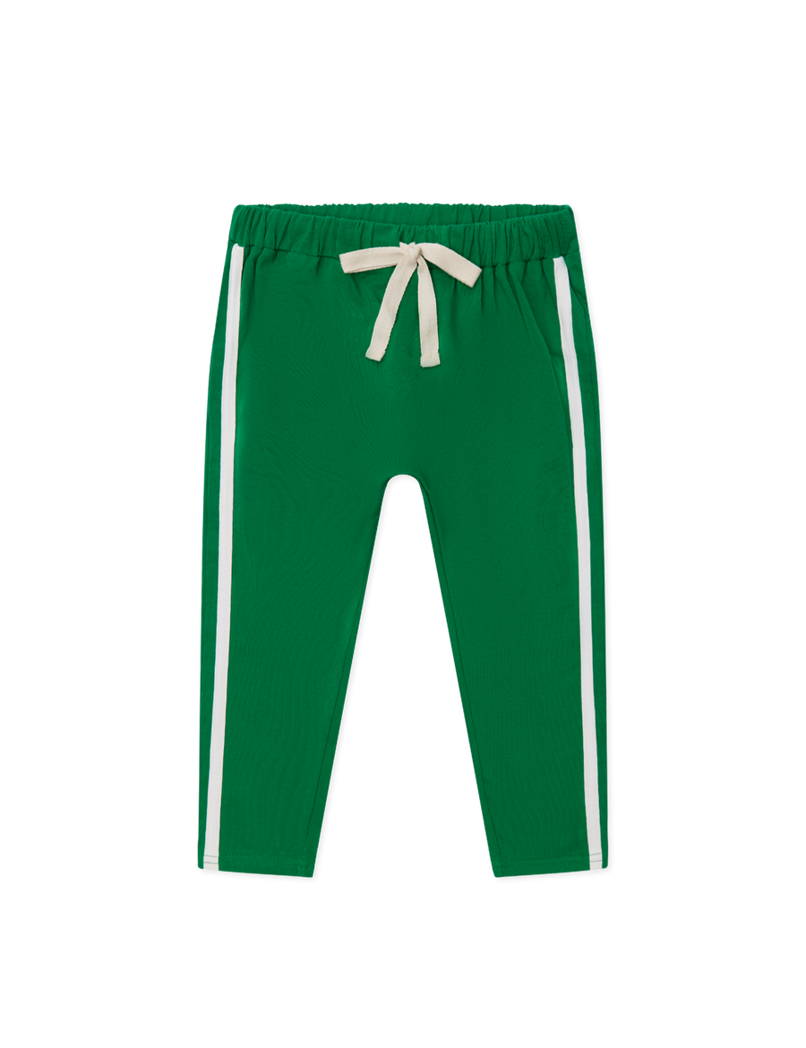 Sonny Label Circus26 forest green slouch pants flat lay on a grey background.