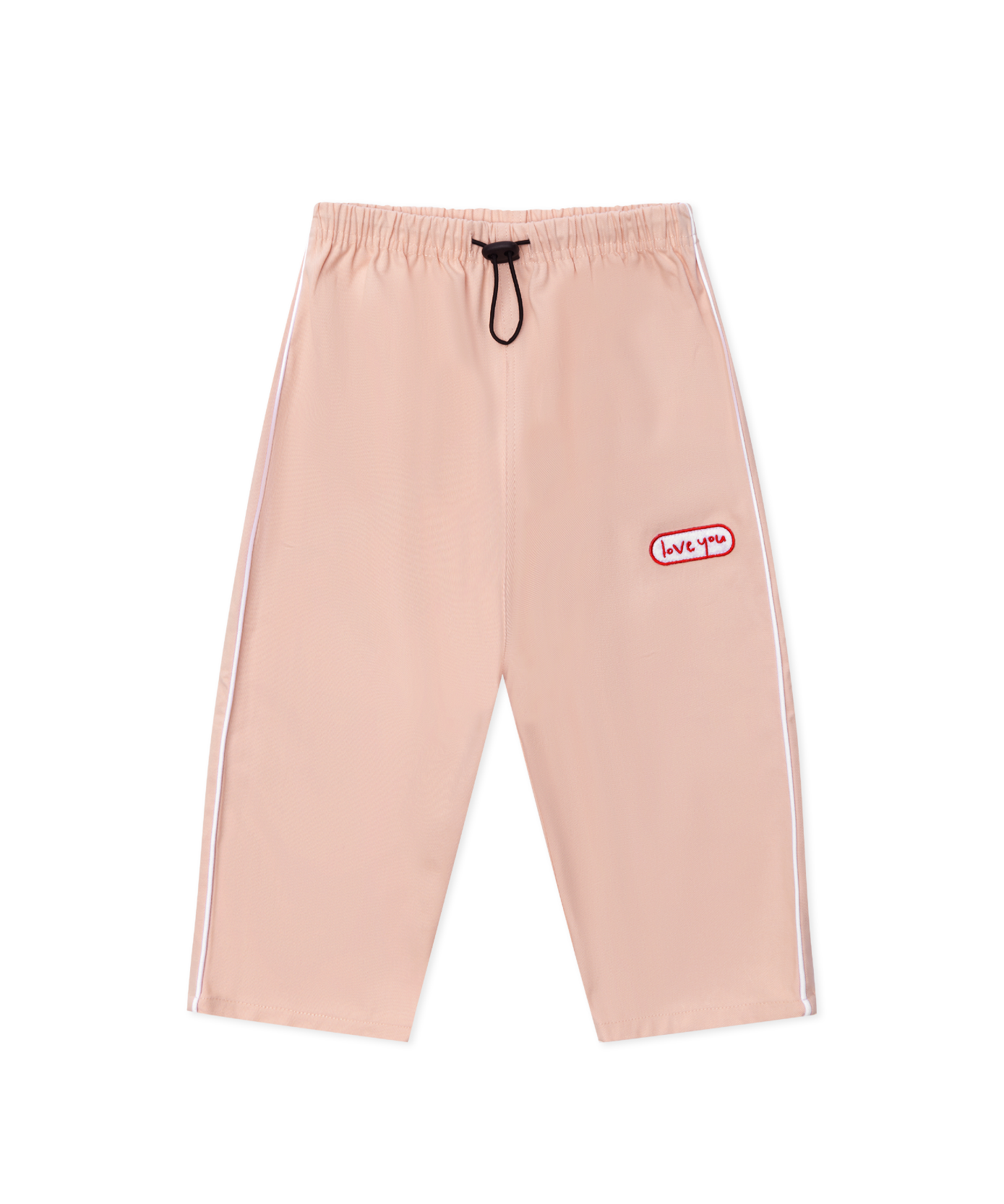Sonny Label Circus26 floss pink sport pants flat lay on a grey background.