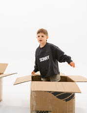Kids retro sweatshirt in Charcoal with appliqué elbows and frayed hem by Sonny Label