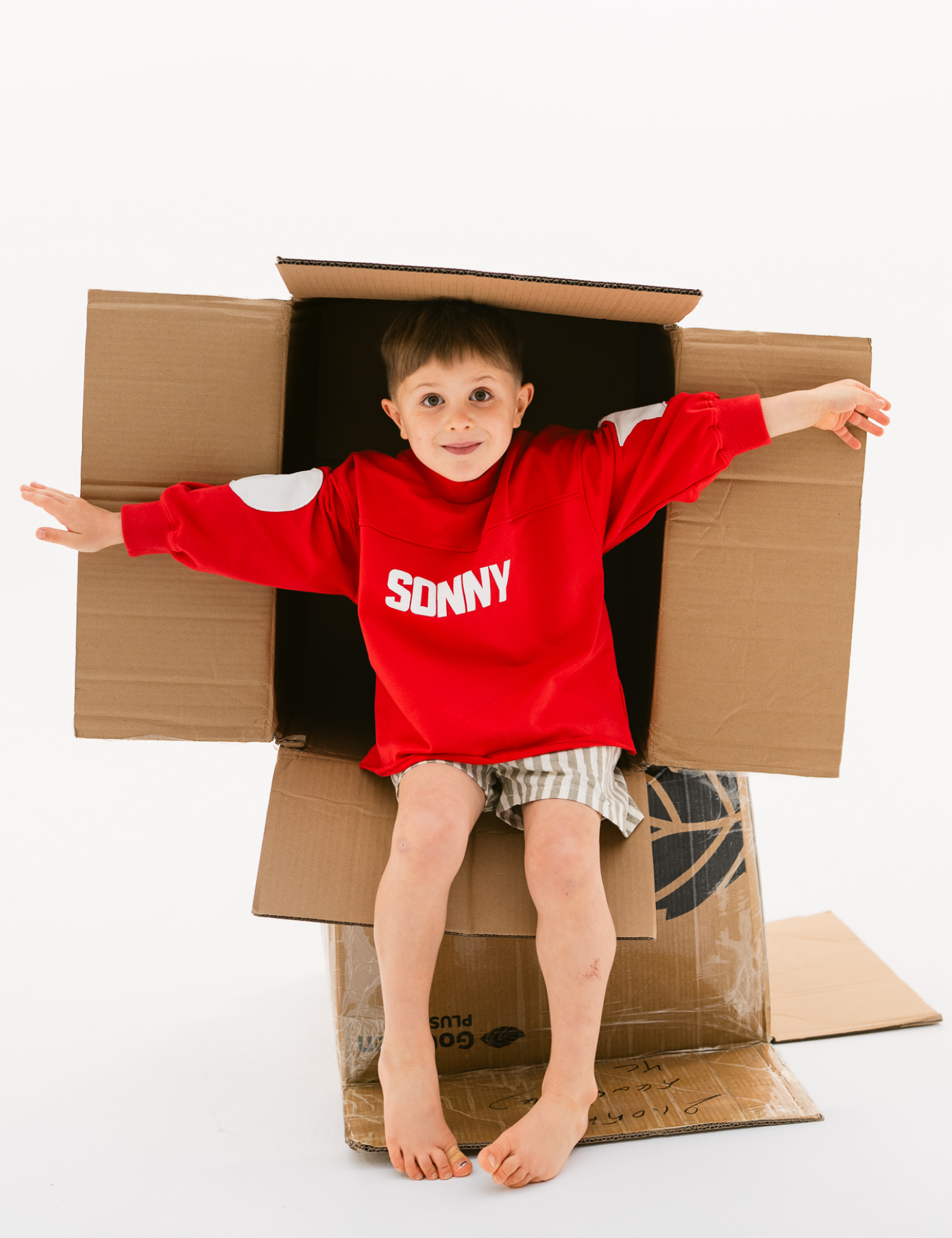 Kids retro sweatshirt in Cherry red with appliqué elbows and frayed hem by Sonny Label