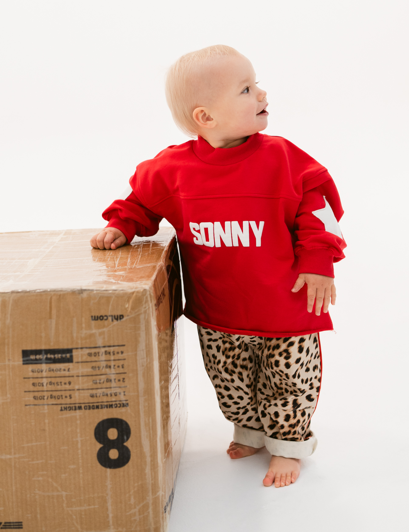 Kids retro sweatshirt in Cherry red with appliqué elbows and frayed hem by Sonny Label