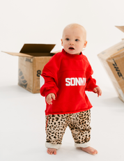 Kids retro sweatshirt in Cherry red with appliqué elbows and frayed hem by Sonny Label