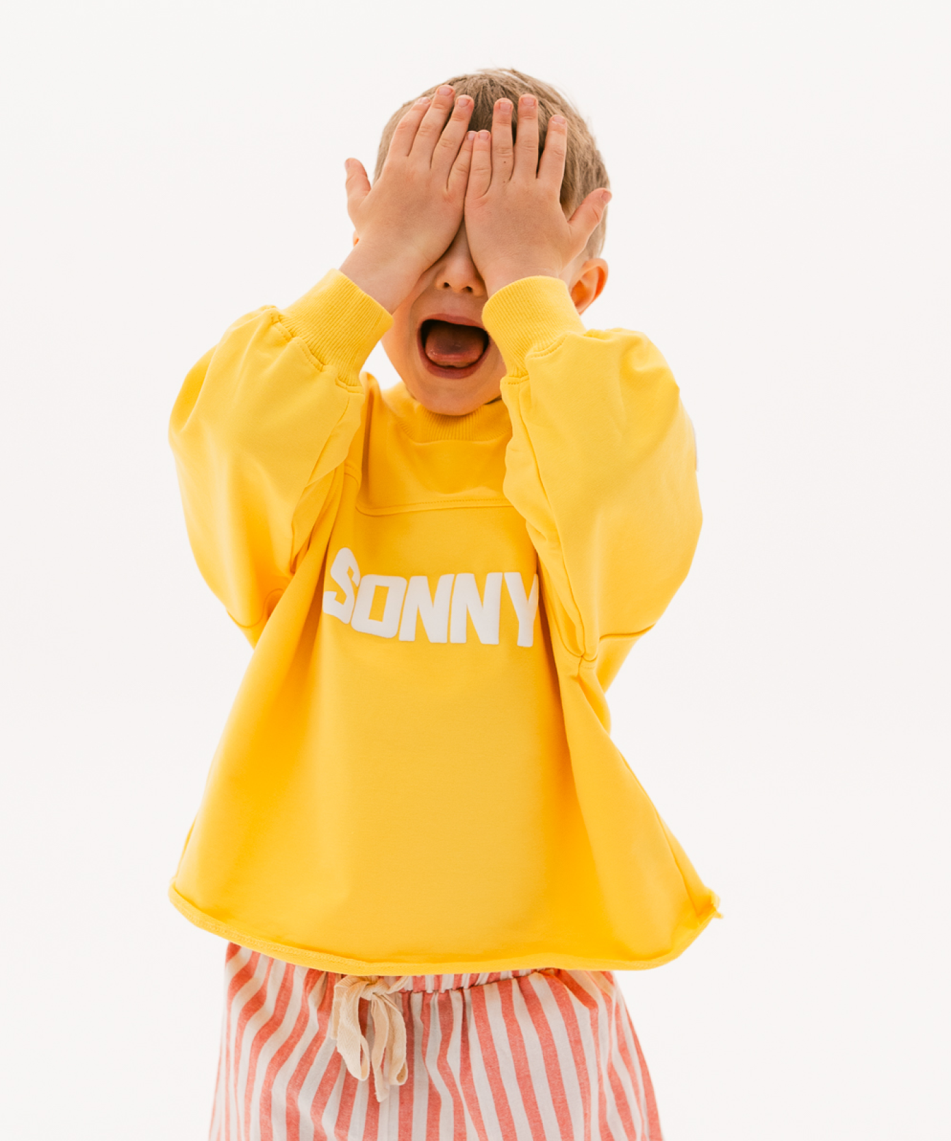 Kids retro sweatshirt in Sunshine yellow with appliqué elbows and frayed hem by Sonny Label