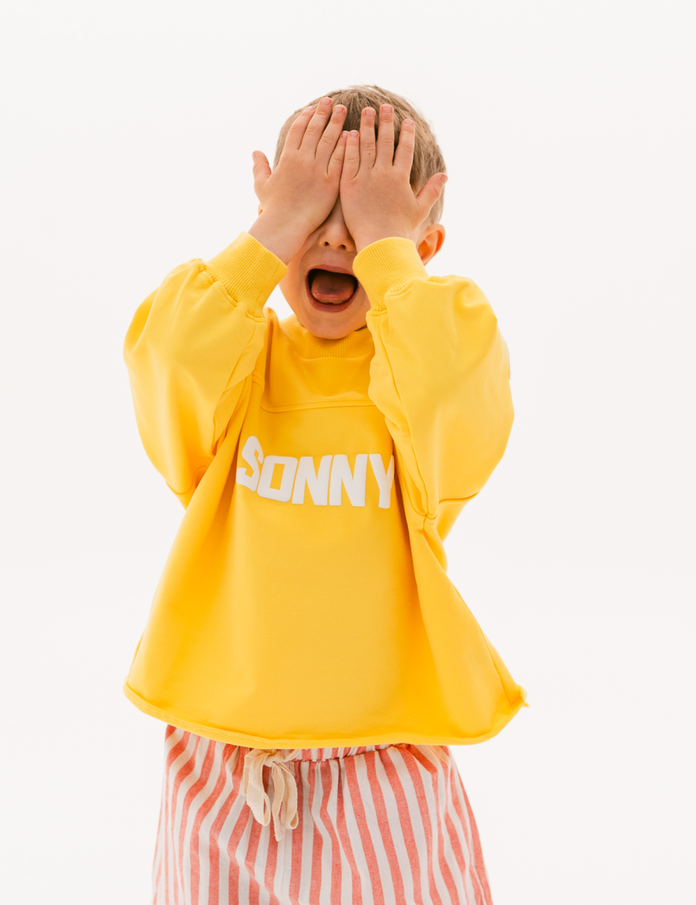 Kids retro sweatshirt in Sunshine yellow with appliqué elbows and frayed hem by Sonny Label