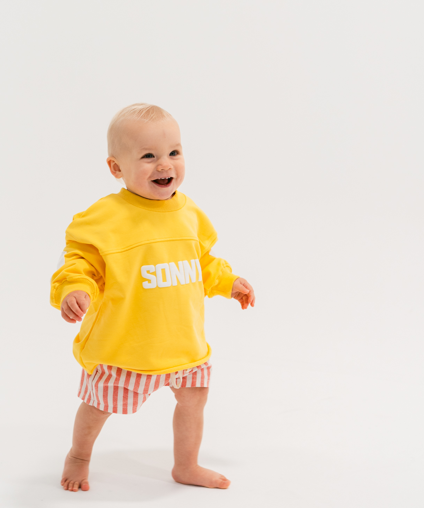 Kids retro sweatshirt in Sunshine yellow with appliqué elbows and frayed hem by Sonny Label
