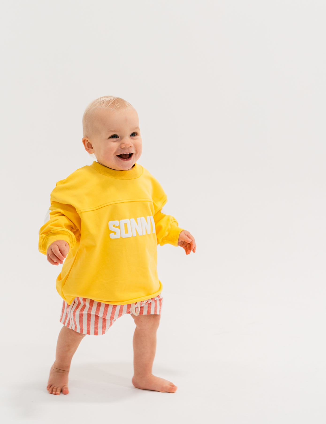Kids retro sweatshirt in Sunshine yellow with appliqué elbows and frayed hem by Sonny Label