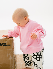 Kids sloppy joe jumper in Flamingo pink with embroidered Sonny logo