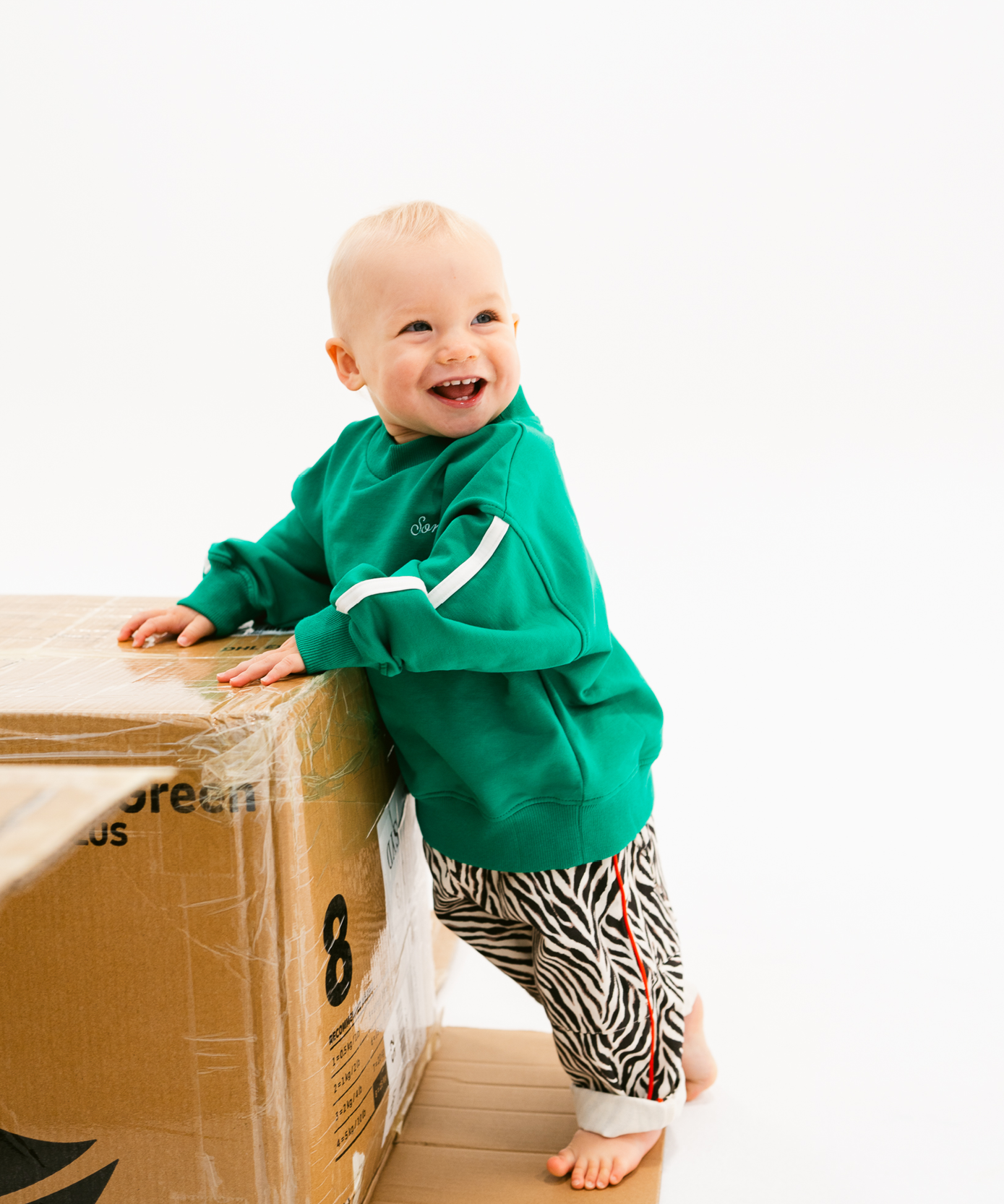 Kids sloppy joe jumper in Pickle green with embroidered Sonny logo