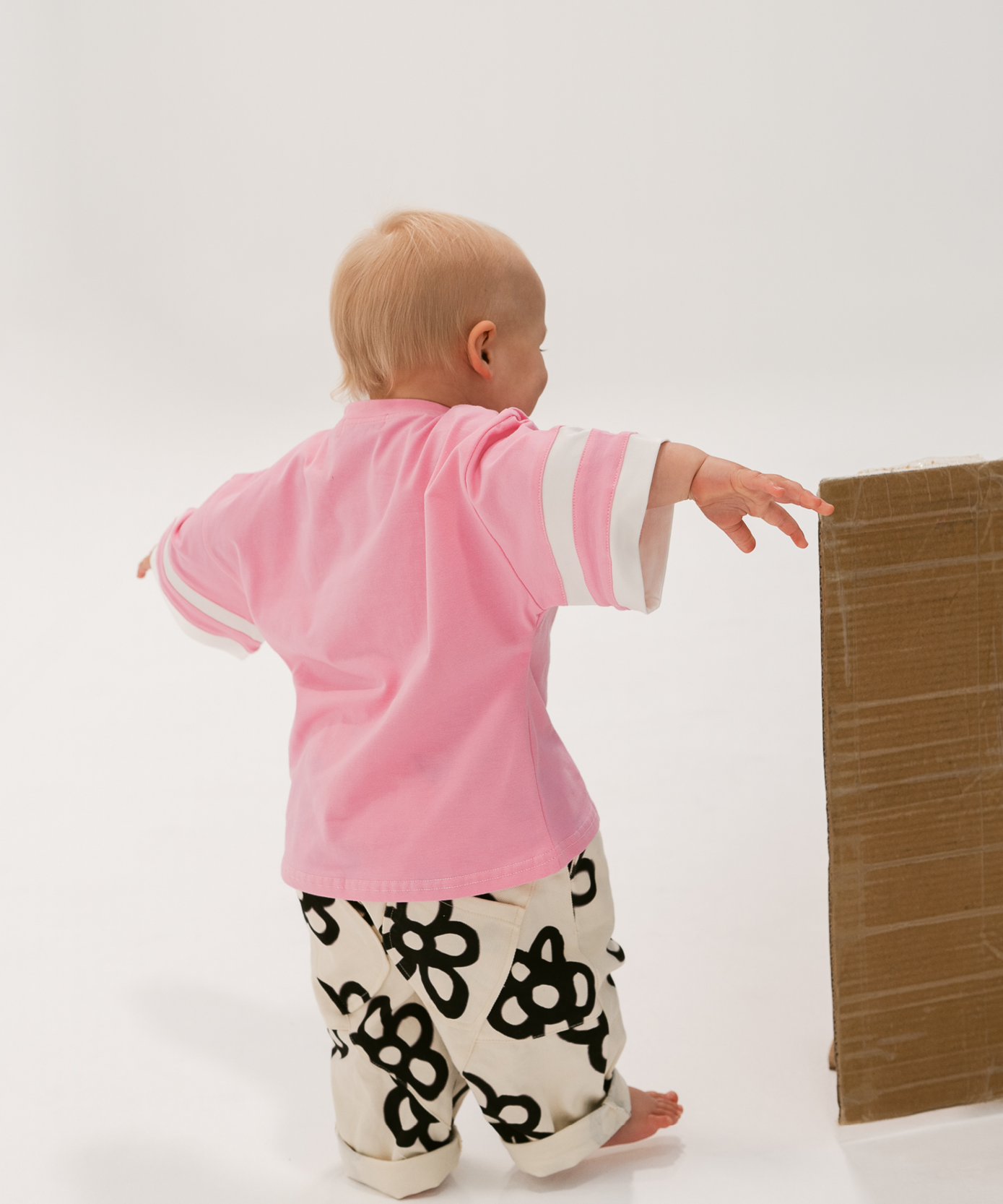 Kids oversized sports tee in Flamingo pink with multi-panel sleeves by Sonny Label