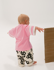 Kids oversized sports tee in Flamingo pink with multi-panel sleeves by Sonny Label
