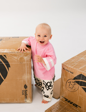 Kids oversized sports tee in Flamingo pink with multi-panel sleeves by Sonny Label