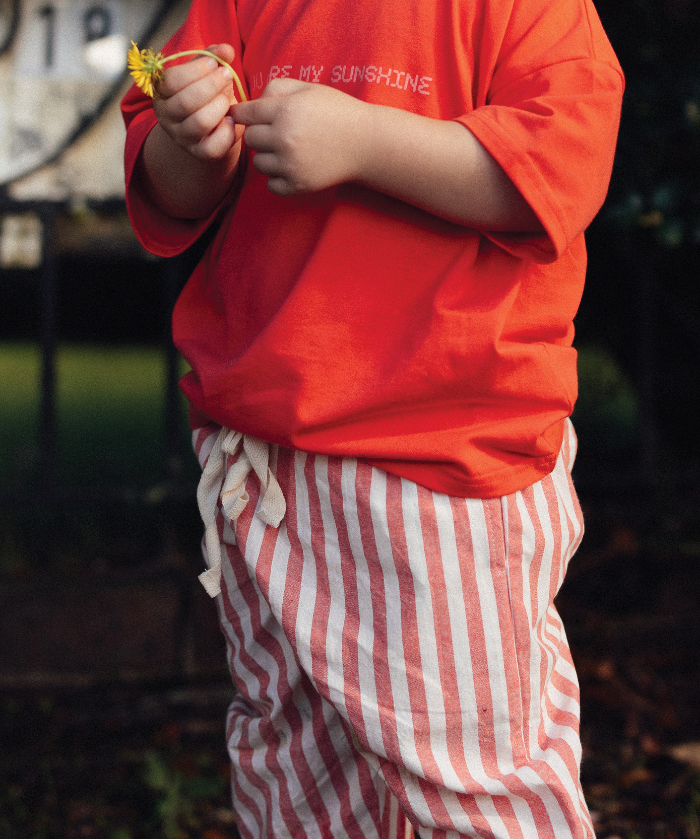 Child wearing Sonny Label SonnyFaves colourful kids clothing. Variant upload.