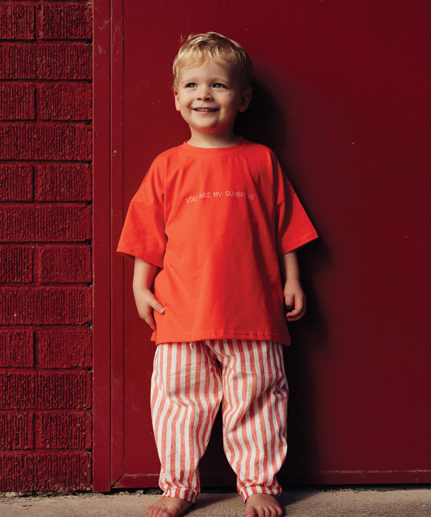 Child in Sonny Label SonnyFaves colourful kids clothing. Variant upload.