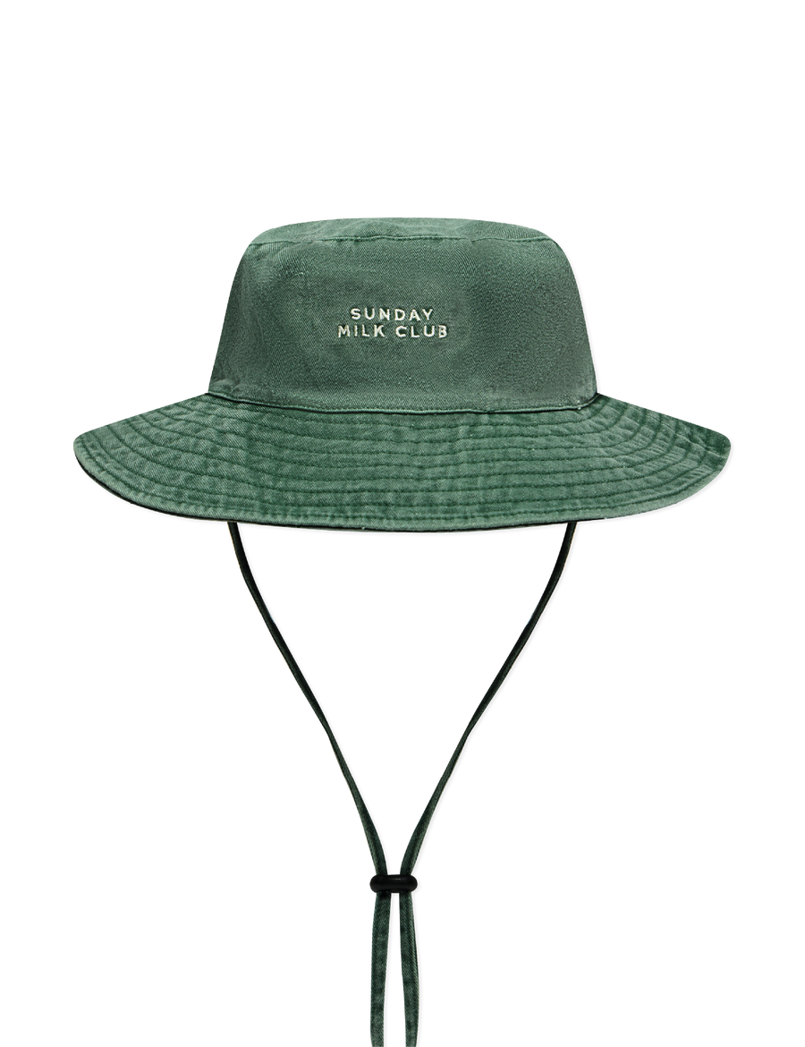 Sonny Label Sunday Club bucket hat flat lay on a grey background.