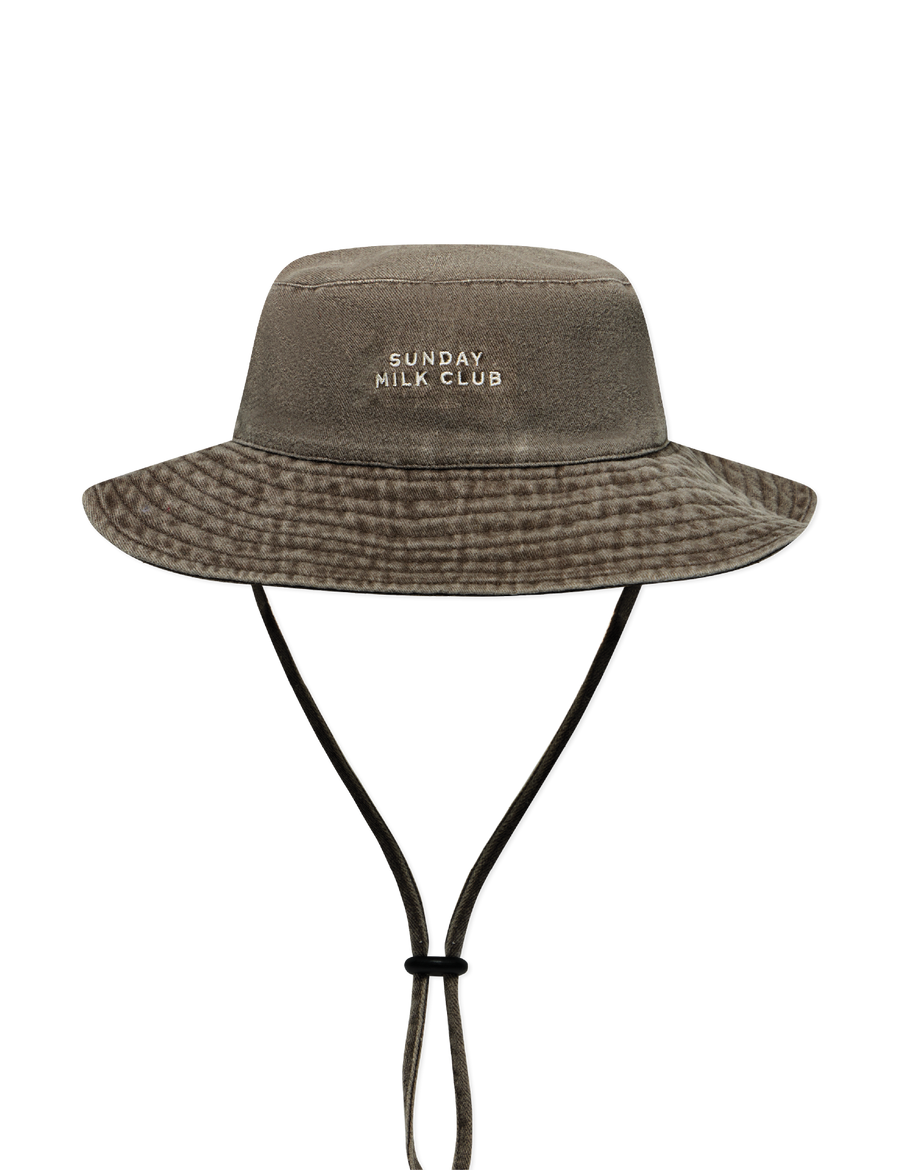 Sonny Label Sunday Club bucket hat flat lay on a grey background.