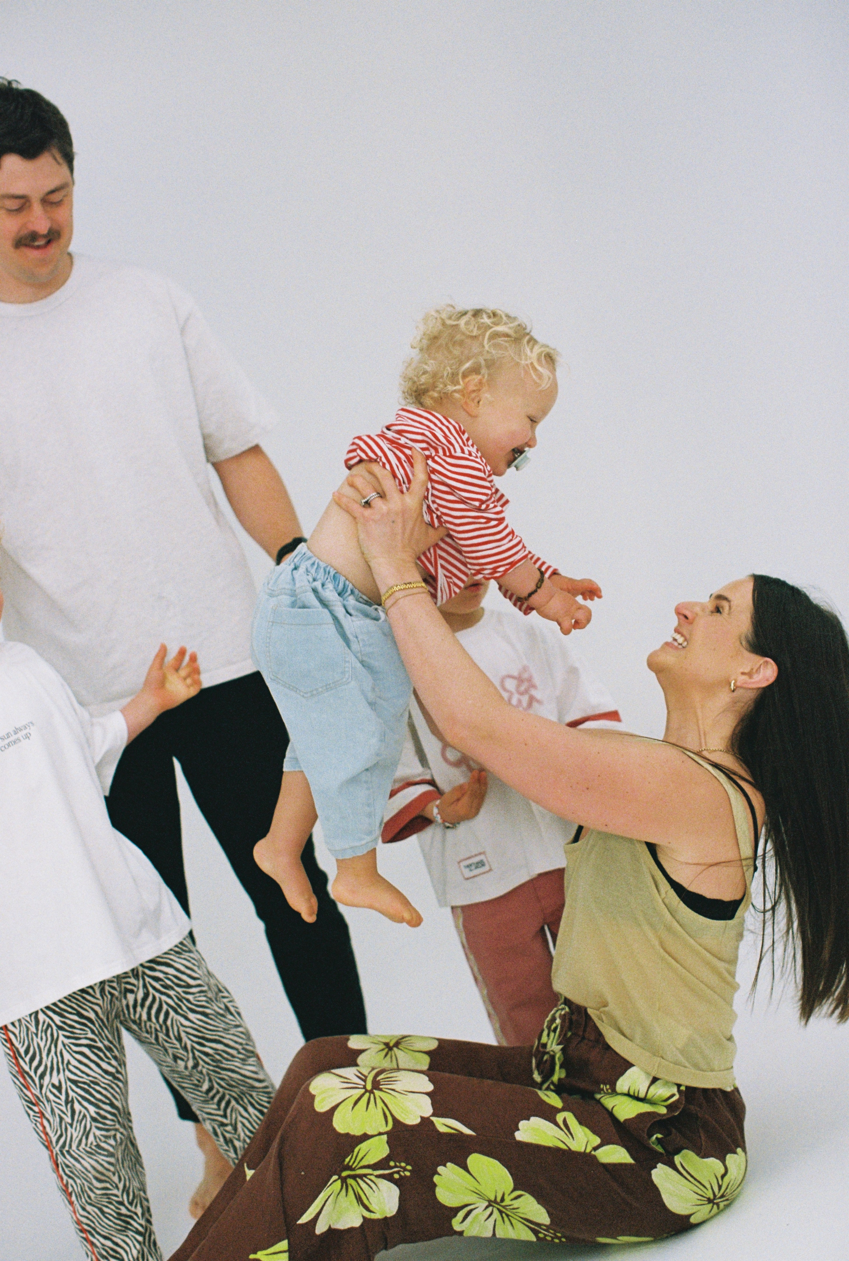 Sonny Label lifestyle family shot on Kodak Ultramax 400 film — warm, candid feel with kids in colourful pieces.